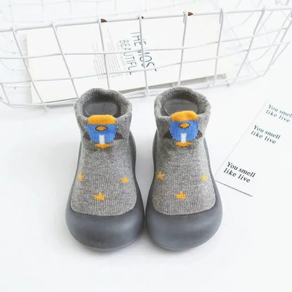 Chaussons-chaussettes bébé antidérapants semelle souple coloris gris