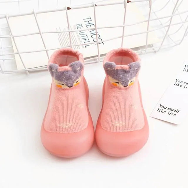 Chaussons-chaussettes bébé antidérapants semelle souple coloris rose