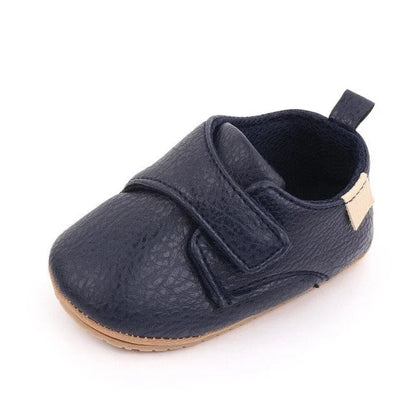 Chaussures bébés en cuir bleu marine à scratch