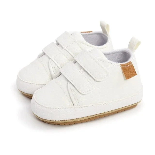 Chaussures en cuir premier pas bébé coloris blanc