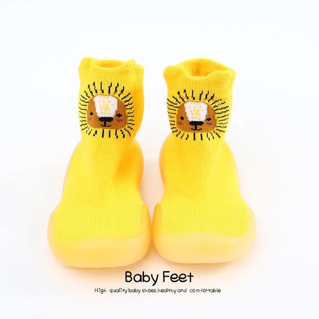 Chaussons chaussettes bébé antidérapant coloris jaune motifs lion